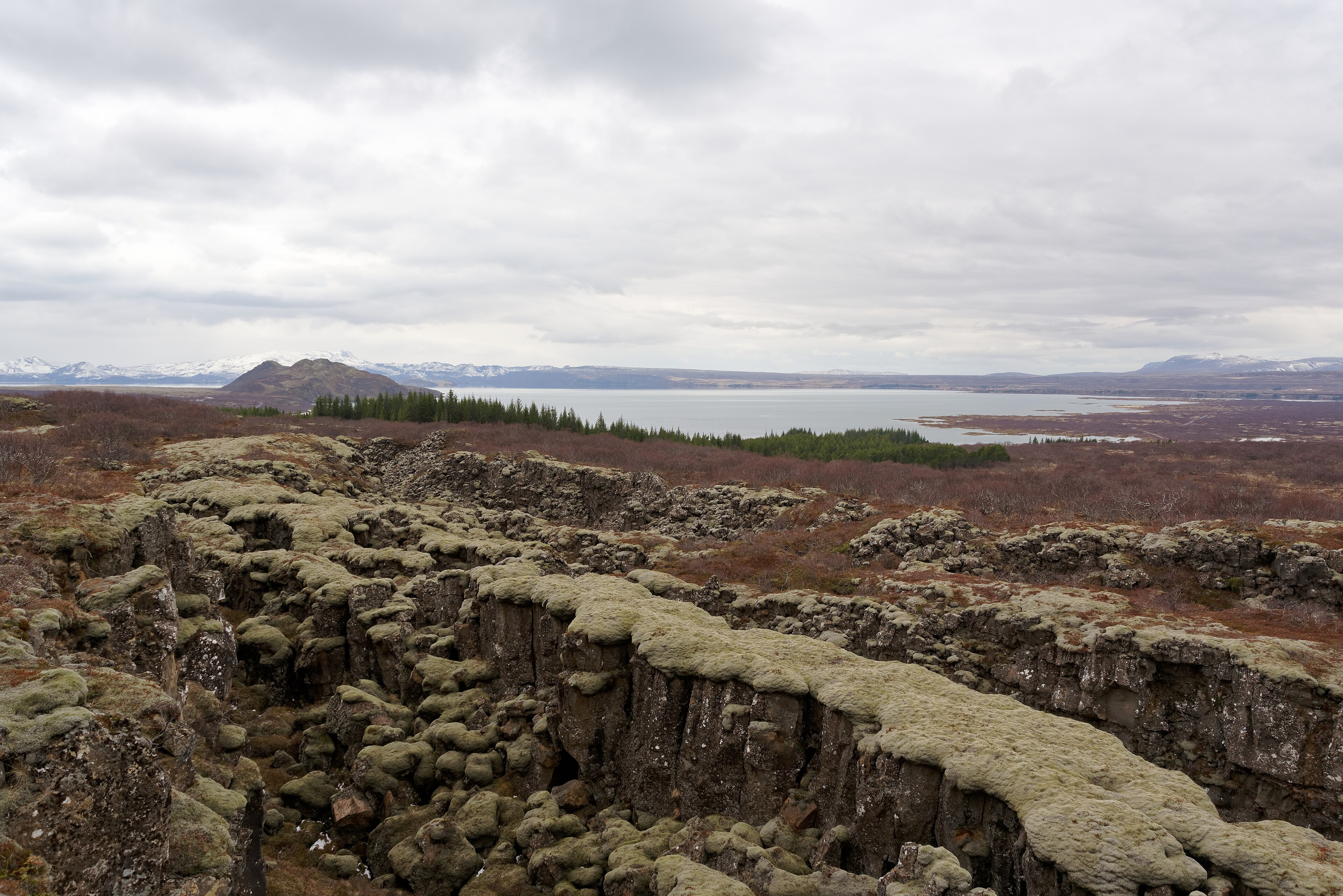 The rift valley at Þingvellir, with basalt walls and a view toward Þingvallavatn
